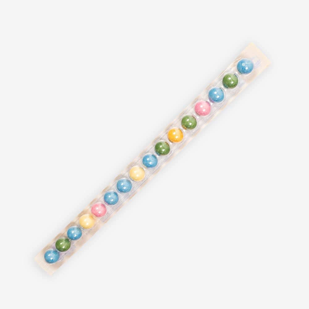 Colourful bubblegum on a white background.