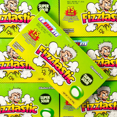 Multiple boxes of Fizztastic candy with cartoon character on a green background