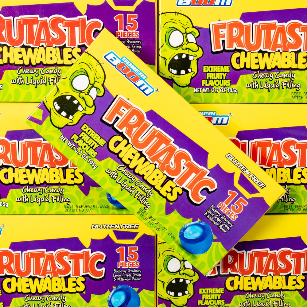 Multiple boxes of Frutastic Chewables candy with colorful packaging.