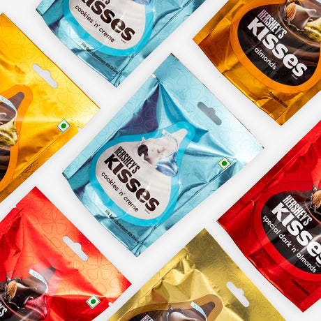 Collection of Hershey's Kisses chocolate packages in various flavors.