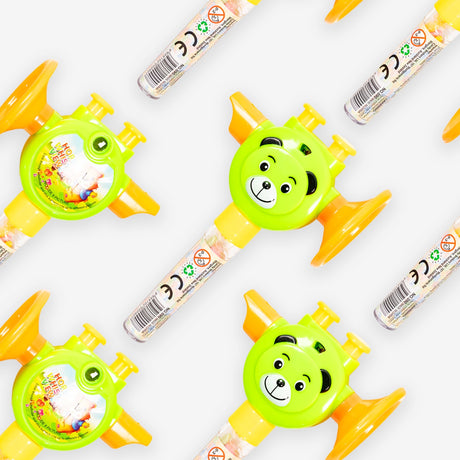 Colorful toys with green faces and orange accents on a white background