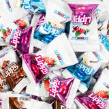 Assorted packets of Lippy candy with colorful packaging.