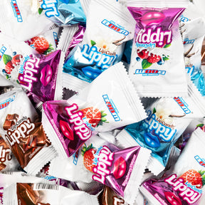 Assorted packets of Lippy candy with colorful packaging.
