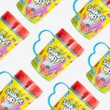 Multiple packages of 'Shake it Up!' candy on a white background
